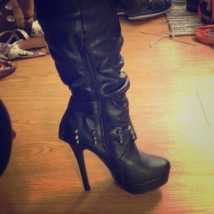 Knee high heeled boots